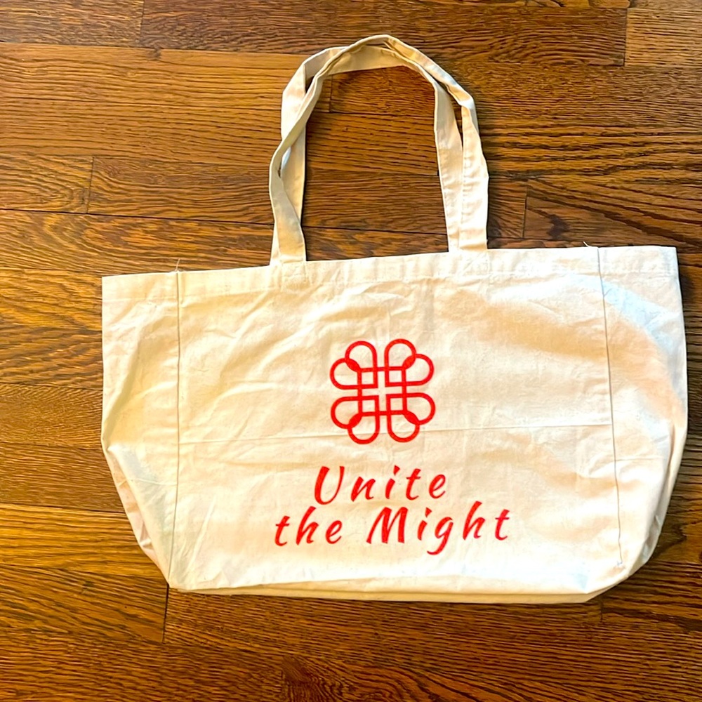 “Unite the Might” cloth tote bag